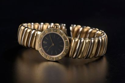 null BULGARI.

Montre bracelet de dame en or 18k modèle "Tubogaz", le boîtier circulaire...