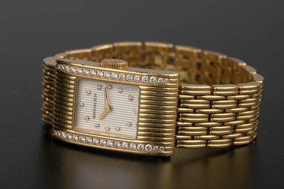 null BOUCHERON.

Ladies' wristwatch in 18k yellow gold, "Reflet" model, the rectangular...