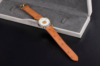 null HERMÈS.

Men's wristwatch model "Sellier", the round case in steel and gilded...
