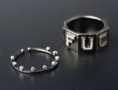 null Octagonal ring in blackened silver with small round brilliant-cut diamonds.

Finger...