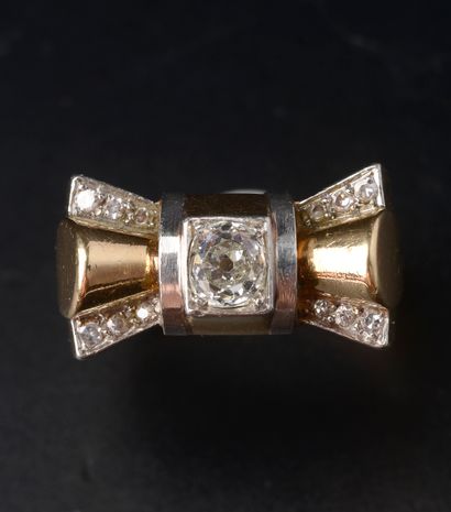 null Ring tank in yellow gold 18k and platinum 850 thousandths, the bezel stylizing...