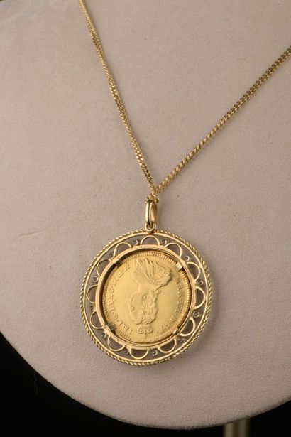 null 18k yellow gold pendant, the circular openwork setting set with twelve small...