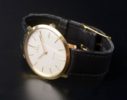 null OMEGA.

Men's wristwatch model "De Ville", the round case in gilded metal, the...