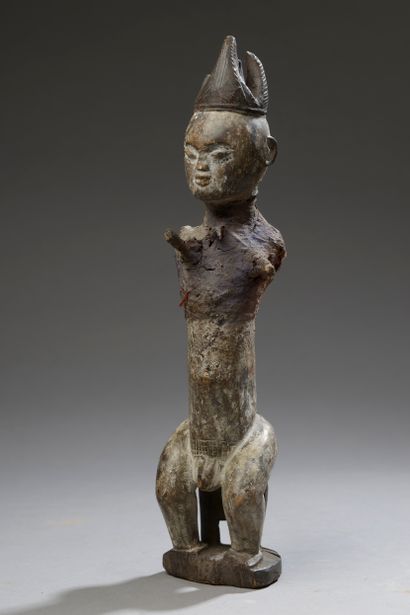 null IGBO statuette, Nigeria. 



Wood and amalgam.



Height : 34 cm. Height : 34...