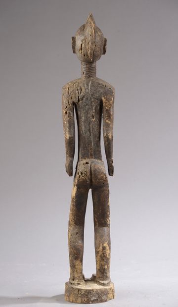 null Large MOSSI statue, Burkina Faso. 



Wood and aluminium.



Height : 97 cm...
