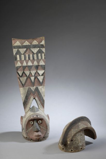 null Mask topped with a small MOSSI pole, Burkina Faso. A crest topped by a crest...