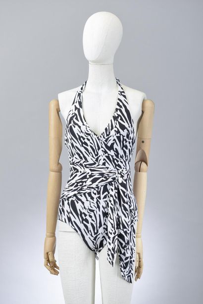 null *DVF - Diane Von Fürstenberg.

Size M, Set includes: 1-piece zebra jersey (437),...