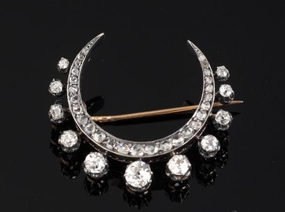 null 18k yellow gold and silver crescent moon brooch set with a line of 27 small...