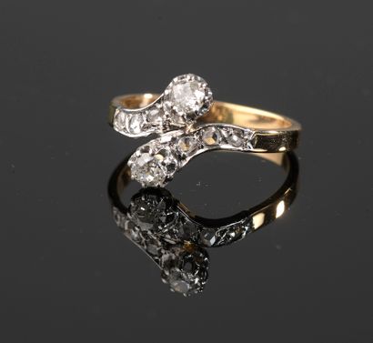 null Ring "Toi et Moi" in 18k yellow gold and 850 thousandths platinum with two old...
