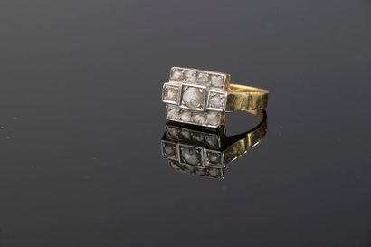 null Ring in 18k yellow and white gold, the square bezel set with eleven small rose-cut...
