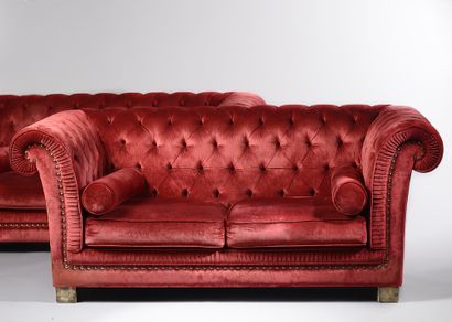 null 
Pair of Chesterfield type sofas in raspberry velvet upholstered and studded...