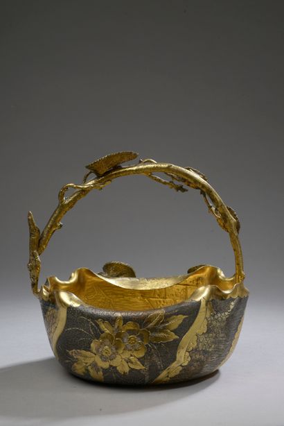 null Silvered and gilded copper basket with flowers decoration, the handle and the...