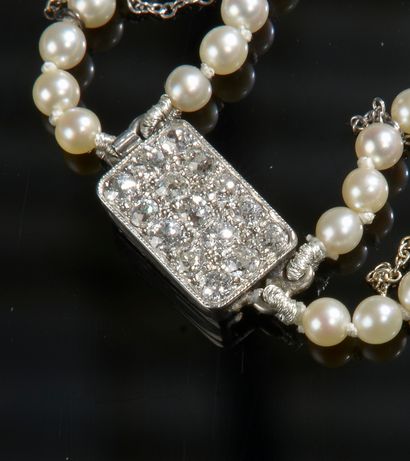 null Necklace with two rows of one hundred and ninety-eight cultured pearls. Rectangular...
