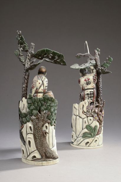 null CHINA - 20th century.

Two groups in polychrome sculpted resin, one showing...