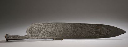 null 
Wrought iron breaching knife engraved with scrolls, a coat of arms with a double-headed...