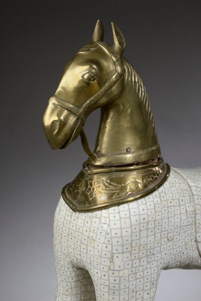 null 
INDIA - Late 19th - Early 20th century.




Horse in ivory veneer and copper...