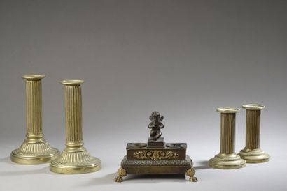 null Set of two pairs of gilt brass torches with fluted shafts resting on a circular...