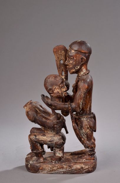 null GHANA, Ashanti culture - Second half of the 20th century. 

Carved wood group...