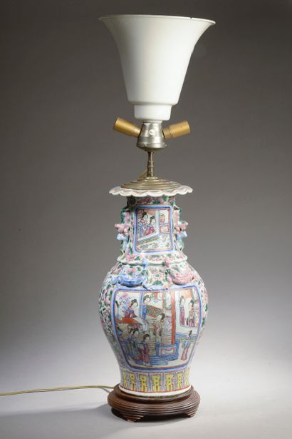 null CHINA - 19th century. 

A porcelain baluster vase with enamelled decoration...