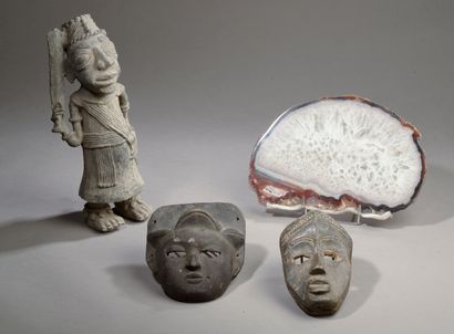 null Set of travel objects including : 



- Two small African decorative masks in...