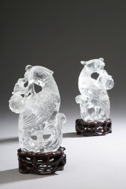 null CHINA - 20th century.

Pair of rock crystal phoenixes (accidents and missing...