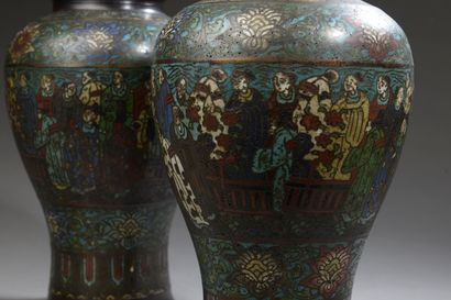 null JAPAN - Circa 1900.

A pair of bronze baluster vases with polychrome cloisonné...