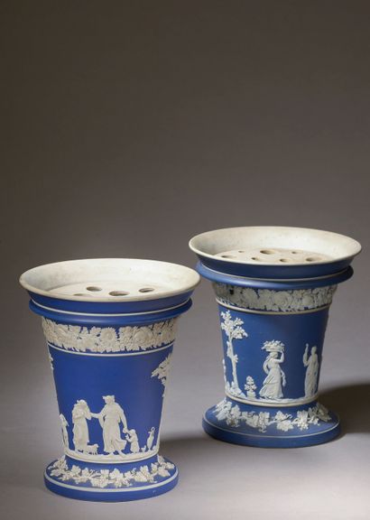 null WEDGWOOD.

A pair of fine earthenware bouquetière vases decorated in very low...