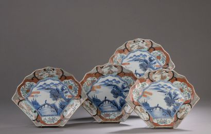  JAPAN, 19th century. A set of four porcelain condiment dishes, the center decorated...