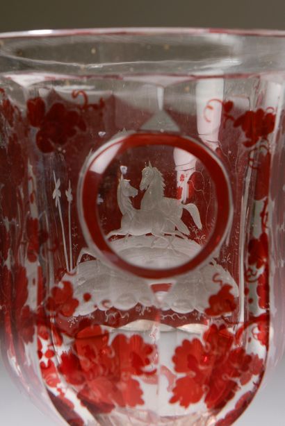  A Bohemian crystal stemmed glass with engraved horses on a ruby background (small...