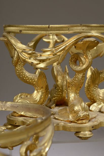 Ten chased and gilded bronze display stands of four different models, including...
