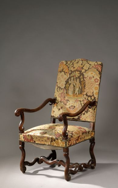 
Moulded walnut armchair, the back straight,...