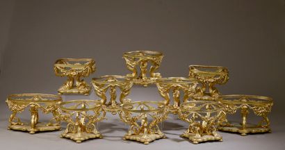 null Ten chased and gilded bronze display stands of four different models, including...