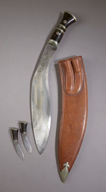  HERMÈS. Nepalese hunting knife (kukri) with curved blade, horn handle and two smaller...