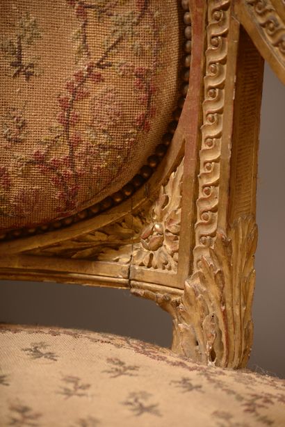 null 
Moulded, carved and gilded wooden lounge furniture (chips and rework), decorated...