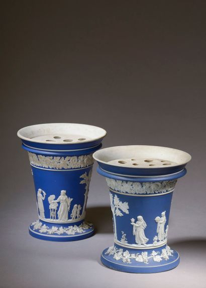  WEDGWOOD. A pair of fine earthenware bouquetière vases decorated in very low relief...