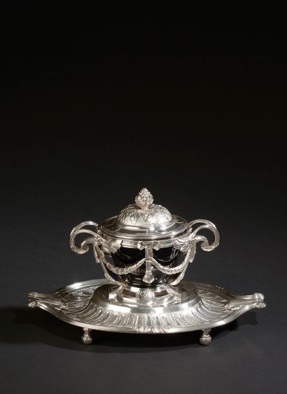 null 
A two-handled chased silver jam jar, the openwork body decorated with a scalloped...