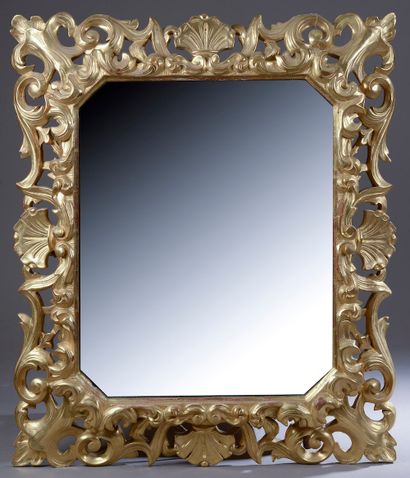 A rectangular bevelled mirror with inverted...