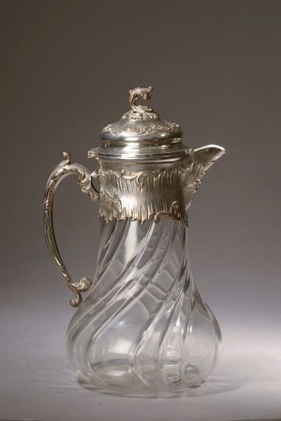 null Large twisted glass ewer, the frame, the lid and the handle in silver with rocailles...