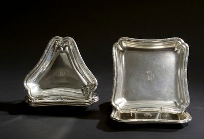Set of four triangular and two square silver...
