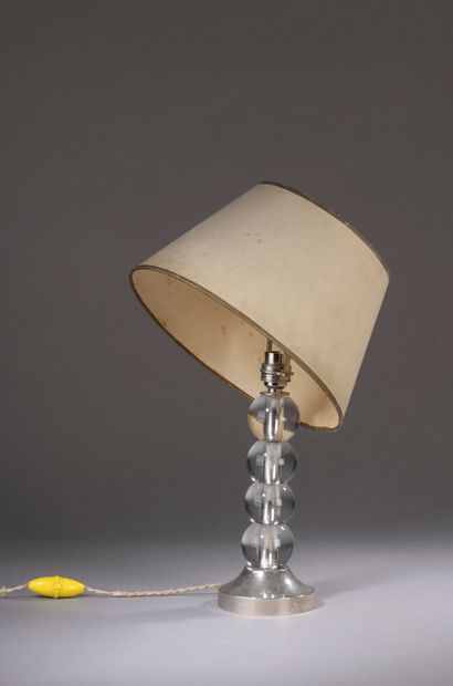  In the taste of Jacques ADNET. Desk lamp with metal stem strung with clear glass...