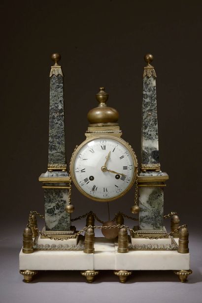 null Portico clock in sea-green marble, white marble and gilt bronze, the case supported...