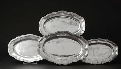 null Four oval silver dishes with contoured edges, engraved later with the arms of...