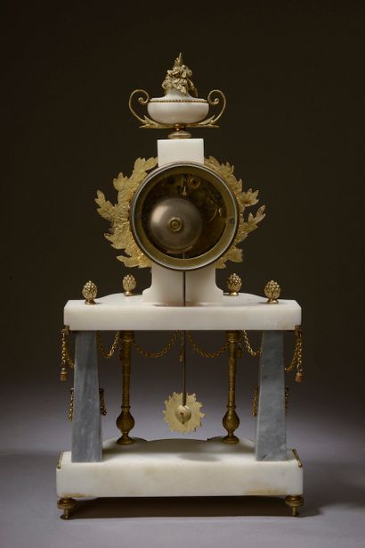 null White marble, grey marble and gilt bronze mantel set composed of:

- a small...