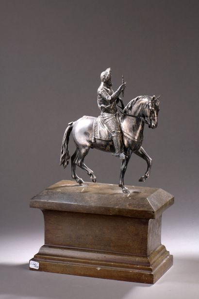 null École française du XIXe siècle.

Henri IV à cheval.

Bronze argenté (petites...