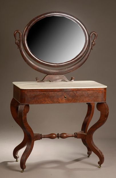  Mahogany and mahogany veneer dressing table, the ovoid mirror with swan necks, the...