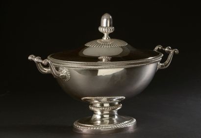 null A large doubled metal tureen on a pedestal, the whole underlined by friezes...