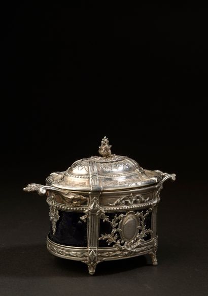 null Oval sugar bowl with two silver handles, the body openwork of medallions foliated...