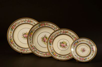 null LIMOGES, HOUSE ROUART.

Part of a porcelain dinner service with rich polychrome...