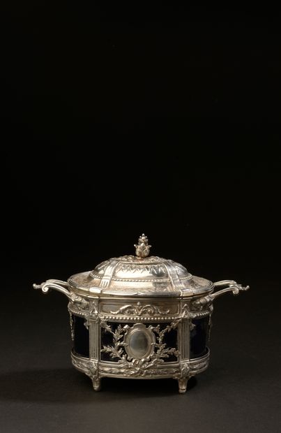 Oval sugar bowl with two silver handles,...