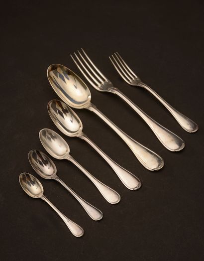 null A set of silver cutlery, with threaded handles and a gadrooned end. It includes...